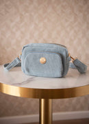 Sac banane avec distributeur de sacs canins intégré